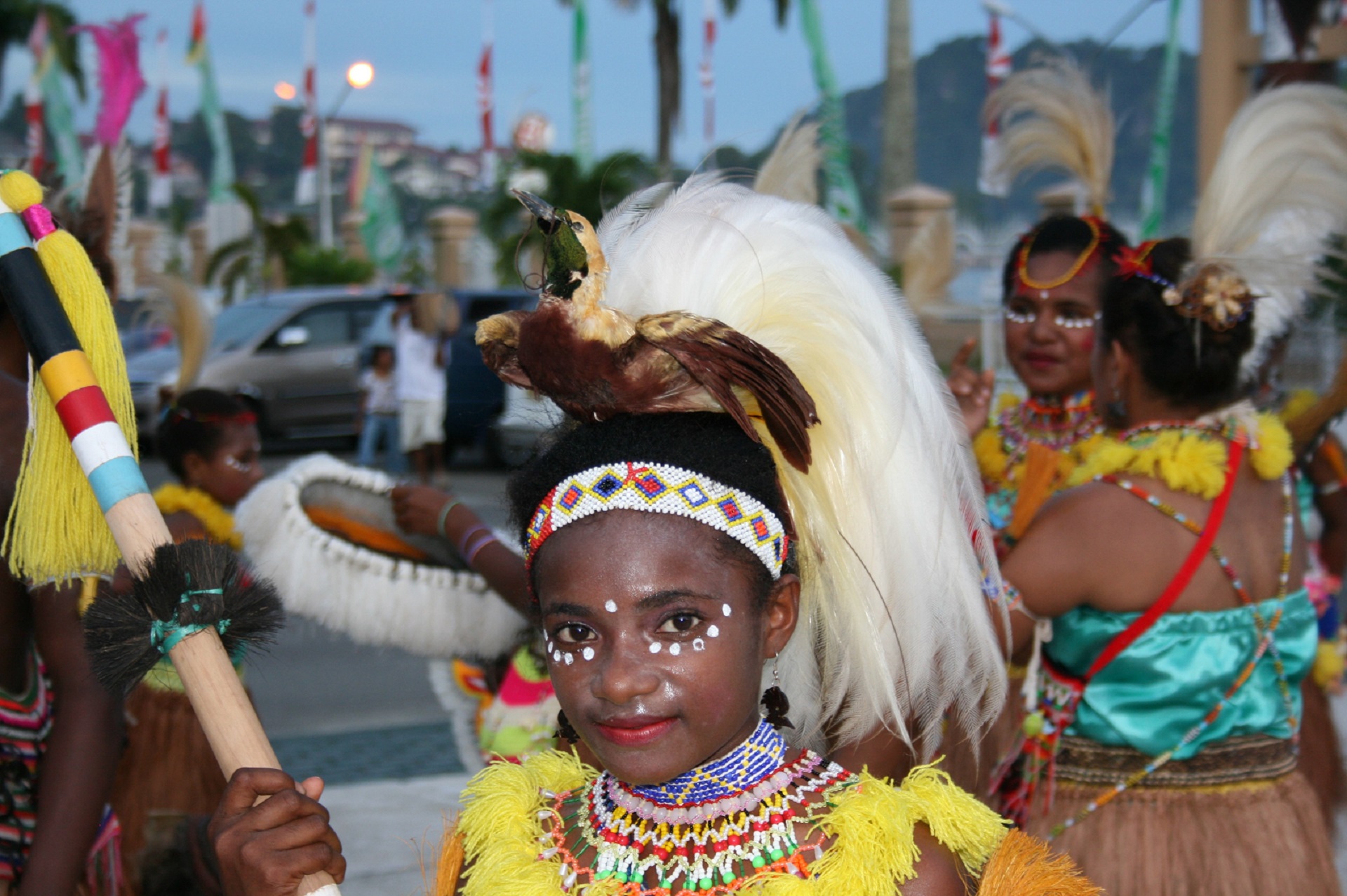 To this day, Papuans still wear mounted birds of paradise with their sumptuous tailfeathers on their heads for special occasions, like the young dancer in this picture